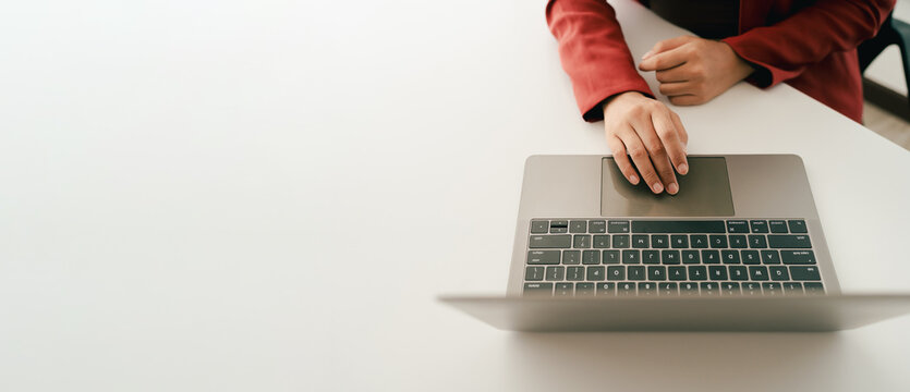 Close-up portrait typing keyboard on laptop computer. Working online on white table at office. Facebook chat. Website meeting. Blogger. Journalist writing articles. online job ideas