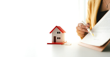 Portrait of a Home Purchase Agreement
Real estate agent delivers a model home to a client, mortgage, loan, lease-purchase agreement, and home sale.