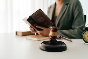 Female consultant or lawyer working in office. Legal concept. Justice and legal advice. Male judge...