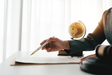 Female consultant or lawyer working in office. Legal concept. Justice and legal advice. Male judge in courtroom.