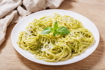 plate of pasta with pesto sauce
