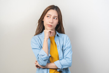 Thinking with problem, frustrated asian young woman, girl expression face thoughtful, brunette hair...