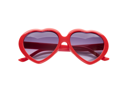Red heart shaped sunglasses for fashion and love concepts. A fun, retro style accessory for a party, summer, or Valentine's Day. isolated on white background with clipping path.