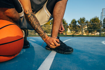 Athletic preparation on an outdoor basketball court
