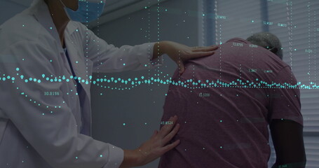 Examining patient's back, healthcare professional using data image for analysis