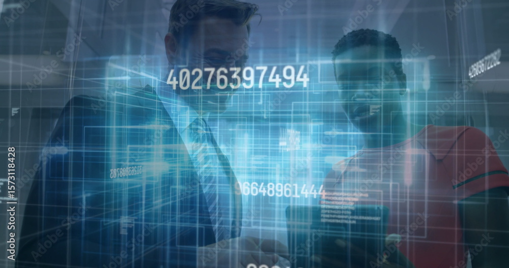 Poster smiling man in suit viewing smartphone with colleague in red top in lobby, with holographic codes