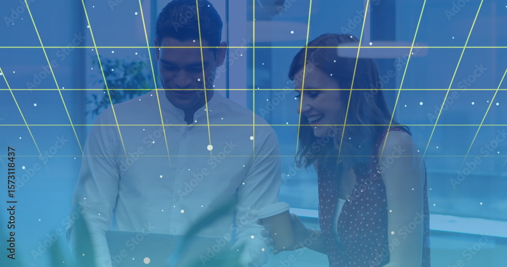 Poster collaborating colleagues using laptop with digital grid and data points overlay