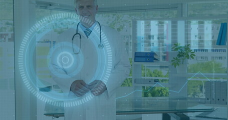 In modern office, doctor in white coat using digital medical image interface