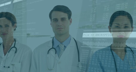 Doctors with encryption and data processing image overlay in hospital setting