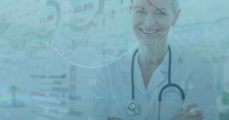 Standing white lab coat doctor analyzing digital financial graphs in clinic office, copy space