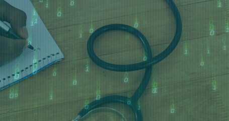 Plaid-sleeved hand writing with black pen in spiral notebook on desk with stethoscope, data overlay