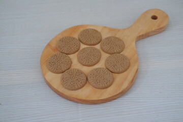 Homemade Biscuits Displayed on Round Cutting Board