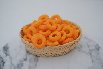 Cheese Ring Snacks in a Woven Basket