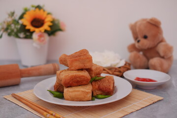 Fried Tofu Snack with Green Chilies on Plate