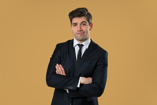 Confident arrogant businessman posing with smug expression and crossed arms - Powered by Adobe