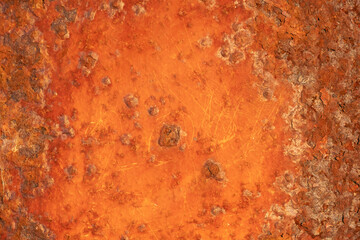 Background image of rusted metal wall showing decay patterns, suitable for retro textures, natural material references and graphic design elements. Texture