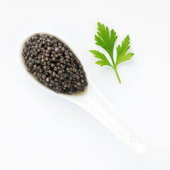 Seafood delicacy photo black caviar clean background, elegant minimal composition, top-down...