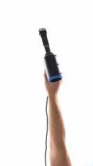 Hand with hair clipper on white