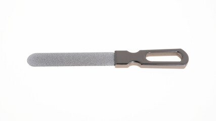 Ergonomic metal nail file for trimming