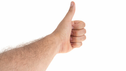 Hand giving thumbs up gesture in bright light