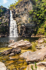 a beautiful waterfall on a sunny day
