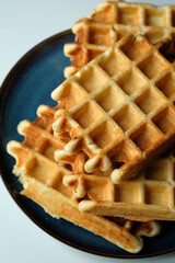 belgian waffles on a plate close-up