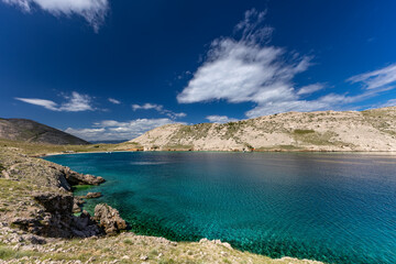 Panorama of the bay with the Vela Luka beach below, view of the beach from the top of the mountain,...