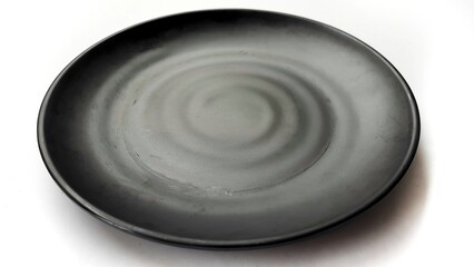 Empty circle black plate with ceramic melamin material isolated on white background