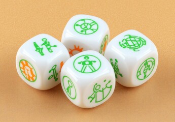 Four white dice with green symbols