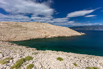 The picturesque bay and pebbly empty beach of Konjska on the island of KRK,