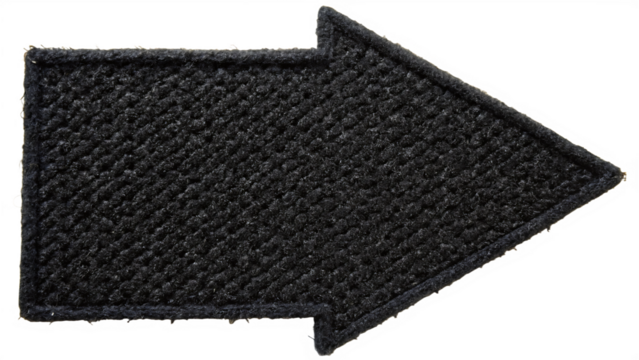 A simple black fabric arrow patch is isolated on a transparent background