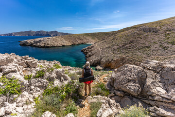 The picturesque bay and pebbly empty beach of Konjska on the island of KRK,