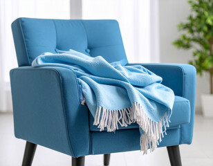 A close-up of a warm, comforting blanket draped over a generic medical armchair, signaling a patient-centered approach.