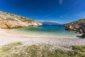 The picturesque bay and pebbly empty beach of Konjska on the island of KRK,