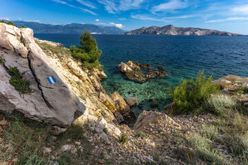 The picturesque bay and pebbly empty beach of beach Vreženica on the island of KRK,