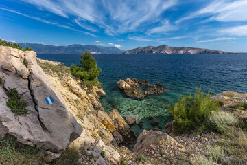 The picturesque bay and pebbly empty beach of beach Vreženica on the island of KRK,