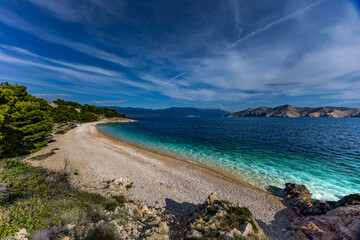 The picturesque bay and pebbly empty beach of beach Vreženica on the island of KRK,