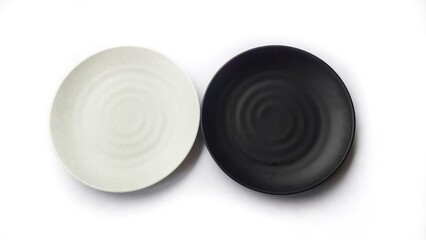 Empty circle white and black plates with ceramic melamin material isolated on white background