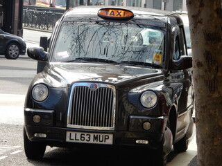 A black English taxi cab.