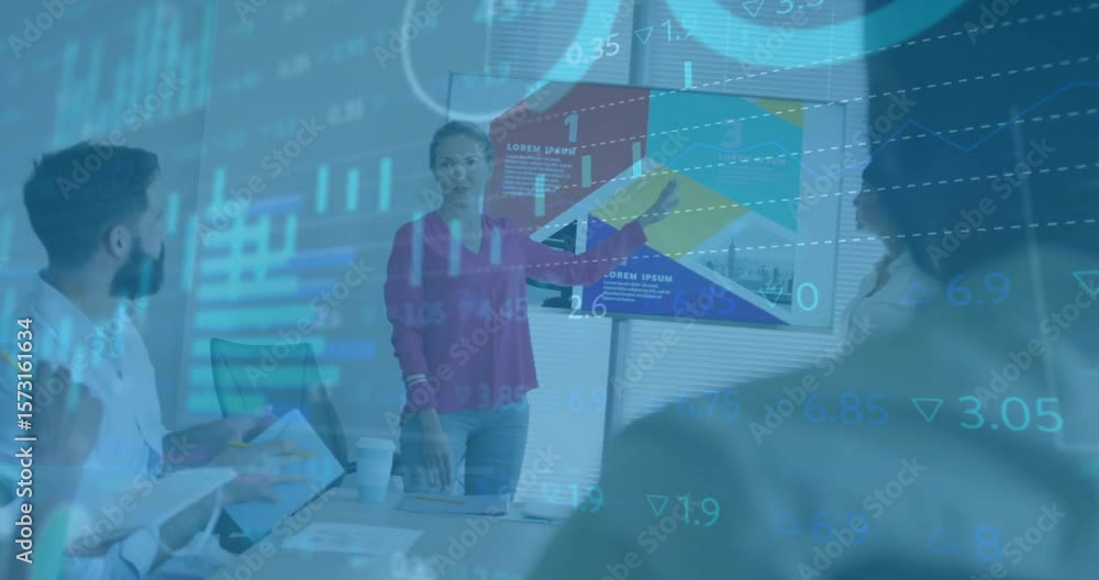 Poster presenter gesturing chart to team, inviting analyst input while colleague noting financial trends