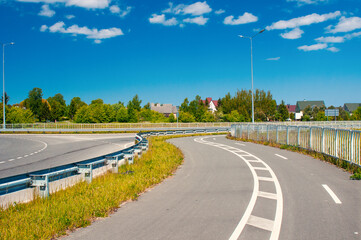 Bike path in country near roadway in summer
