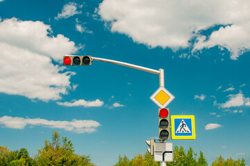 Traffic light in country under cloud sky