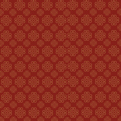 Seamless floral repeated pattern on red background