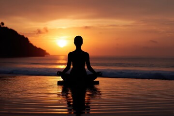 A silhouette of a person sitting in a yoga position on the beach at sunset, with detailed features highlighted