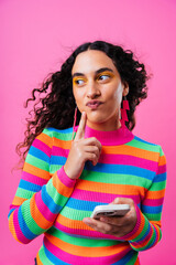 Creative studio portrait of beautiful hispanic woman with diastema