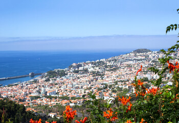 Beautiful view of the city and ocean on a summer day. Top view. Funchal. Madeira. Portugal.