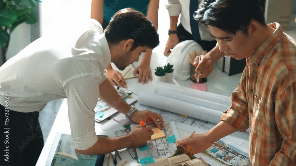 Aufkleber smart architect or civil engineer writing building structure idea on note and stick on blueprint. ae