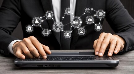 Businessman using laptop with digital network graphic overlay