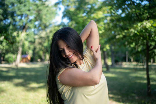 Beautiful female stretching arm for running exercise workout fitness woman wear sports outfit