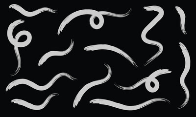 Brush line stroke squiggly paint set on chalkboard. Hand drawn doodle swirl wave brush curly charcoal stroke. Line squiggly paint curly hand drawn ink calligraphy elements. Vector illustration. 